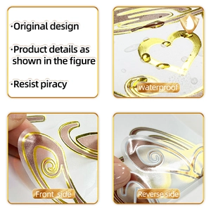 Detailed view of waterproof gold heart stickers showing front and reverse metallic textures