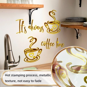 Detail of metallic gold coffee wall sticker with It's always coffee time lettering