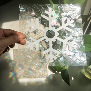 Rainbow snowflake static glass window film with holographic ice texture effect