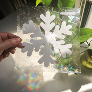 Rainbow refraction effect of snowflake window film under direct sunlight display
