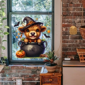Halloween window cling with cartoon highland cow in wizard hat and pumpkin decor