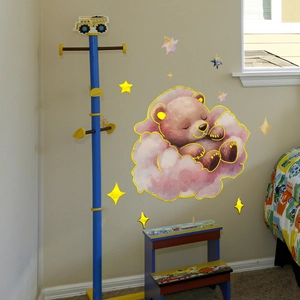Cartoon bear sleeping on pink clouds with gold foil stars wall decals for kids room