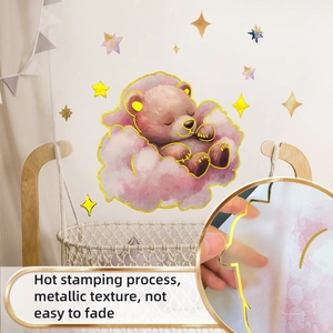 Detail of cartoon bear on pink cloud wall decal with gold metallic hot stamping