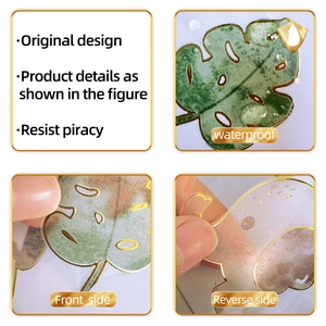 Detail showing waterproof Monstera leaf wall sticker with elegant gold foil outline