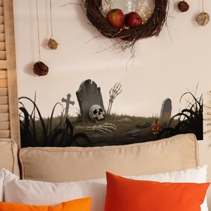 Detail of Halloween graveyard wall sticker with skulls, tombstones and pumpkins