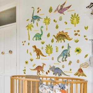 Detail of dinosaur wall decals with gold foil outlines in a cozy children's nursery room