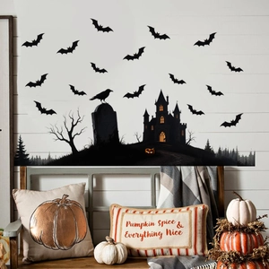 Halloween wall decals set with black bats and matching pumpkin spice decorative pillows