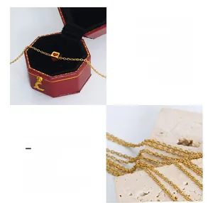 Detail of 18K gold-plated titanium steel square pendant necklace with red heart design