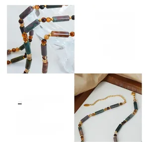 Détail du collier de perles en pierres de cristal colorées et acier titane plaqué or 18K