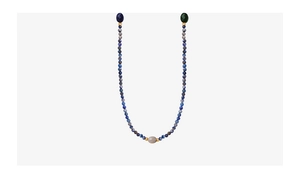 Macro shot of French Baroque beaded necklace with grey natural stone and gold accents