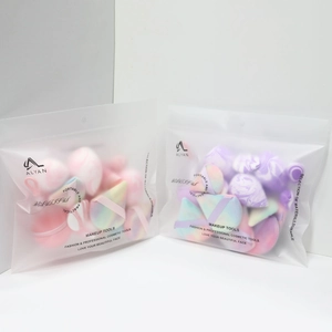 Detail of assorted marble textured makeup sponges in a portable frosted zipper pouch