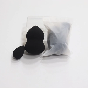 Detail of black beauty blender sponges in different sizes with clear storage box