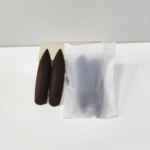 Dual-use makeup sponge set with brown conical beauty blender and premium gold packaging box