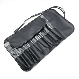 Professional 10-piece black makeup brush set with elegant PU leather rollup pouch case