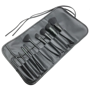 Professional 10-piece black makeup brush set with portable storage roll bag