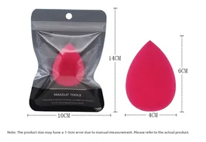 Detail view of pink teardrop makeup sponge and its packaging with size dimensions