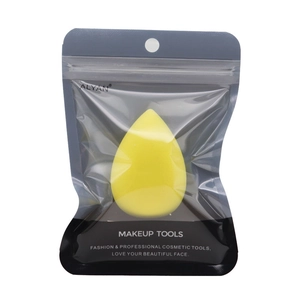 Detailed view of teardrop makeup sponge in a transparent zipper storage pouch