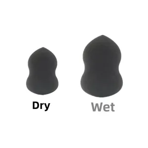 Macro-opname van droge en natte make-up sponsjes die de uitzetting na water laten zien