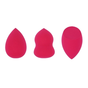 Detailed view of three hot pink makeup sponges in teardrop, gourd, and flat-cut shapes