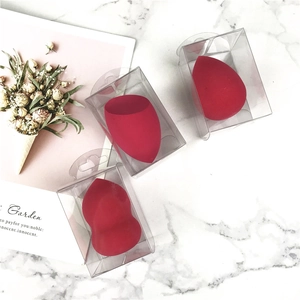 Three-piece red makeup sponge set with drop, gourd, and slanted shapes in clear cases