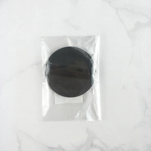 Premium non-latex air cushion puff in black round design with ribbon for liquid foundation
