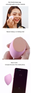 Detailed view of pink non-latex makeup sponges with size comparison and facial application