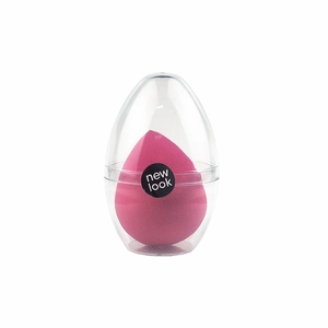 Dettaglio della spugnetta trucco rosa all'interno della custodia in plastica trasparente