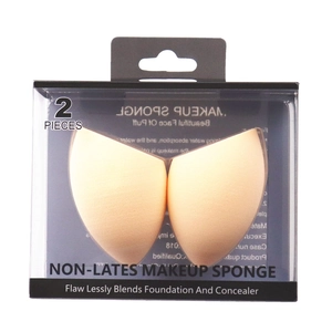 Detail view of two skin-tone teardrop makeup sponges in clear packaging box