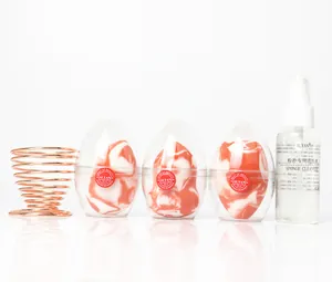Makeup sponge set with 3 marble blenders, rose gold stand, and sponge cleanser bottle