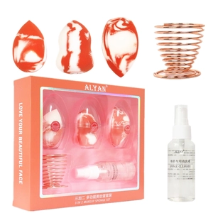 Salmon makeup sponge set with 3 marble blenders, rose gold stand, and cleaner