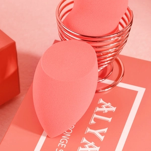 Set de esponja de maquillaje rosa con esponja biselada y soporte espiral oro rosa