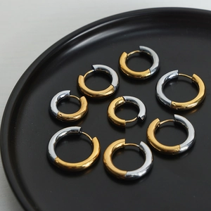 Set of eight two-tone gold and silver polished stainless steel hoop earrings for women