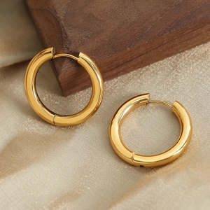 Minimalist 18k gold plated chunky hoop earrings with a polished finish and latch closure