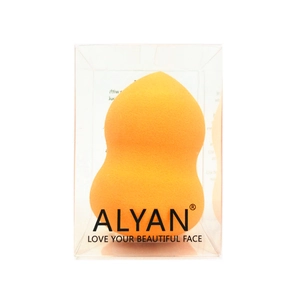 Close-up of orange gourd-shaped makeup sponge in clear retail packaging box