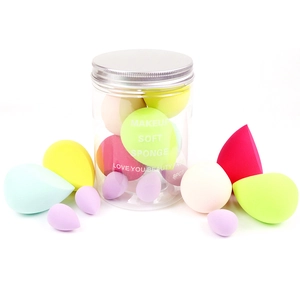 8-piece makeup sponge set with teardrop and slant-cut shapes in a clear storage jar