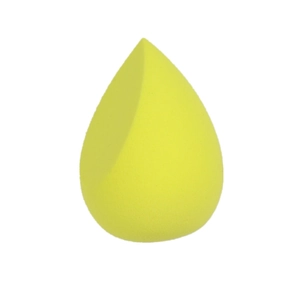 Detail of yellow teardrop makeup sponge with slanted edge for precise makeup blending