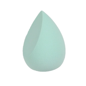 Detailed close-up of mint green teardrop-shaped makeup sponge with flat edge