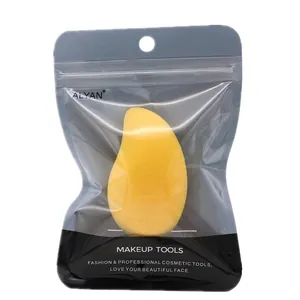Mango-shaped yellow makeup sponge in professional retail pouch packaging
