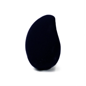 Macro detail of a black teardrop-shaped makeup sponge with a precise pointed tip