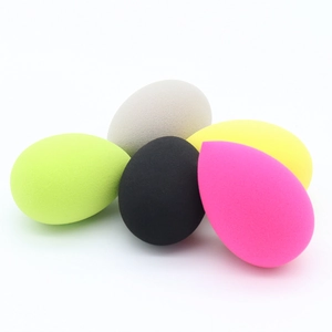 Detailed view of high-density teardrop makeup sponges in vibrant multi-color set
