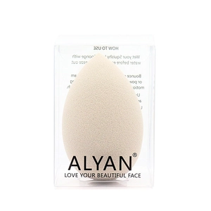 Detail of teardrop makeup sponge in clear packaging with a minimalist logo design