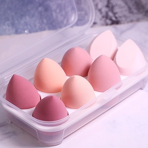 Set de 8 esponjas de maquillaje degradado rosa con caja de almacenamiento transparente