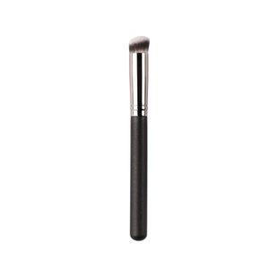 Angled makeup brush with dual-tone synthetic bristles and a matte black handle