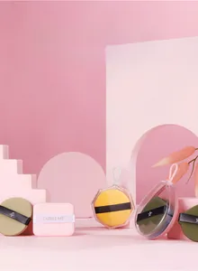 Various shapes of makeup sponges including round and square in a pink aesthetic setting
