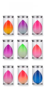 Nine colorful gradient drop-shaped makeup sponges in individual clear cylinders