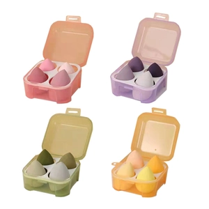 Set de 4 esponjas de maquillaje en una caja de almacenamiento transparente de cuatro ranuras