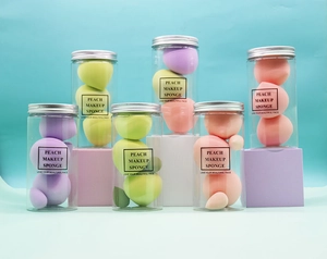 Detail of peach makeup sponges in macro view showing textures in a clear storage jar