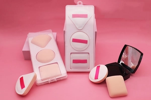 Three-piece Rubycell air cushion puff set in a clear box with diverse shapes and pink ribbons
