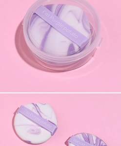 Detailed view of taro purple marble puff with ribbon handle in clear packaging box