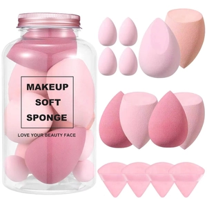 14-piece makeup sponge set in transparent jar with various pink cosmetic blenders